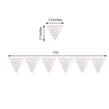 A white triangular banner with rose gold foil dots and polka dots pattern made of paper and cloth, 7.5 inches long
