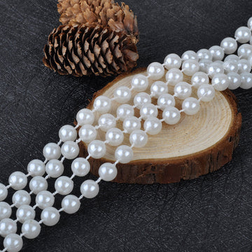 Enhance Your Event Decor with Glossy White Faux Craft Pearl String Bead Strands