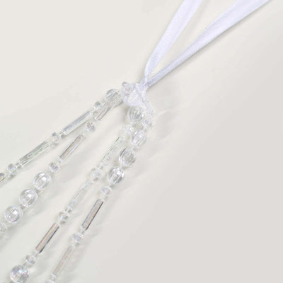 Clear beaded necklace with white ribbon