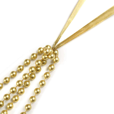Gold pearl necklace with ribbon detail