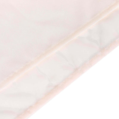 Light pink fabric with a smooth texture and subtle sheen.