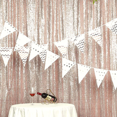 Decorative banner with a sparkling backdrop and wine glass on a table.