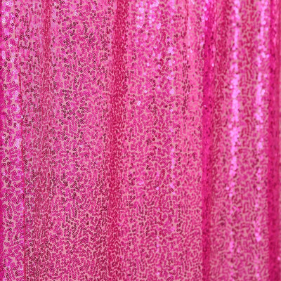 Shimmering pink sequin fabric with a glossy finish.