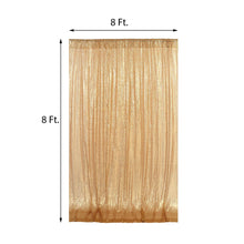 A gold sparkle & sequin curtain with measurements of 8 ft and 8 ft