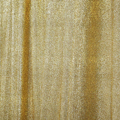 Shimmering gold glitter fabric background for creative projects.