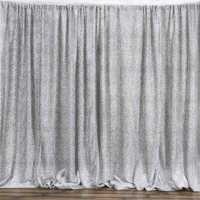 Silver sequin backdrop curtain for events and photography.