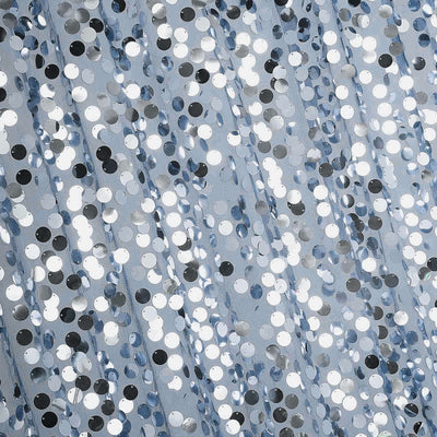 Blue sequin fabric texture with shimmering silver accents.