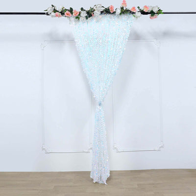 Decorative beaded curtain with floral accents on a white backdrop