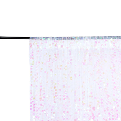 Sheer curtain with pink and gold sequins on a black rod