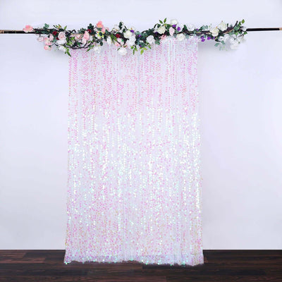 Pink sequin curtain with floral top for decorations or photo backdrops.