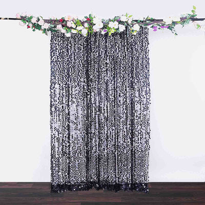 Sequin curtain with floral garland, ideal for events and decorations.