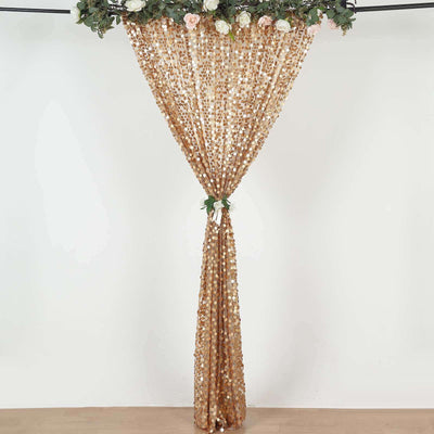 Gold sequin curtain with floral accents for event décor