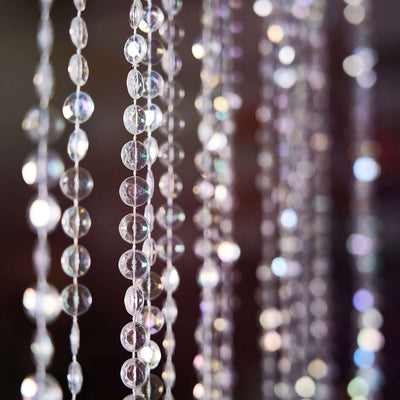 Crystal bead curtain with shimmering reflections.
