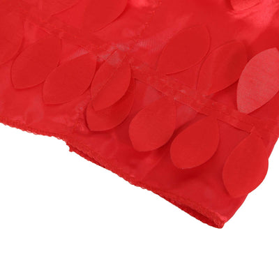 Red fabric with leaf-shaped embellishments, showcasing texture and design details.