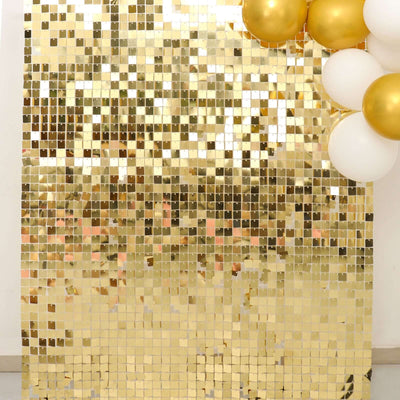 Gold sequin backdrop with balloons for party decoration.