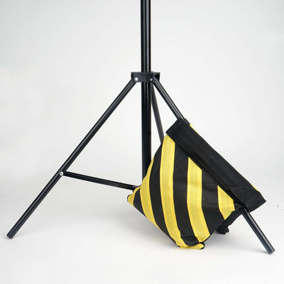 Yellow and black striped sandbag for photography support