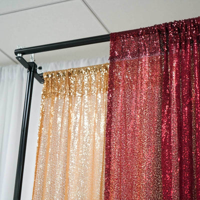 Shimmering gold and red sequin backdrops on a black frame for events and photo shoots.