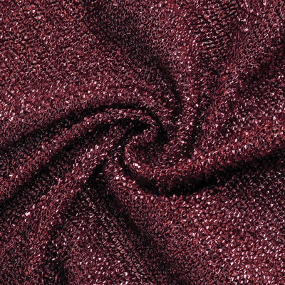Shimmering burgundy fabric with a textured weave.
