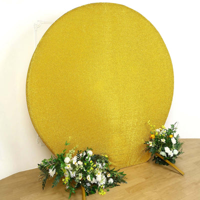 Gold glitter backdrop with floral arrangements for photography