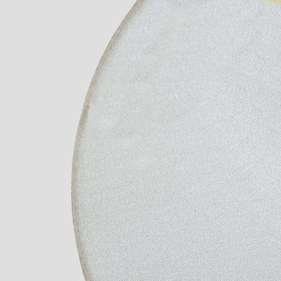Silver round tablecloth on a plain background