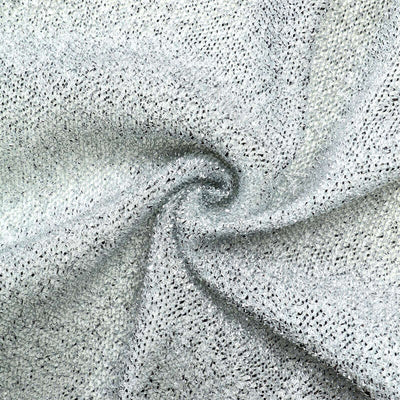 Silver textured fabric swirl close-up for design inspiration.