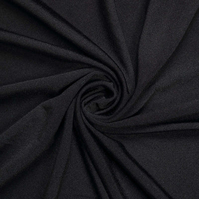 Black fabric with a swirling texture.