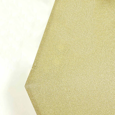 Gold glitter paper sheet in hexagonal shape.