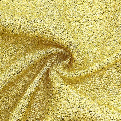 Shiny gold fabric texture with intricate weave details.