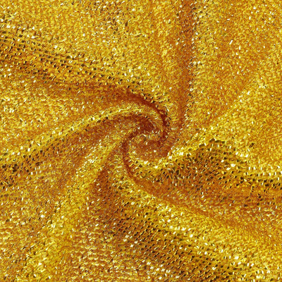 Shiny gold fabric with textured surface and sparkling details.