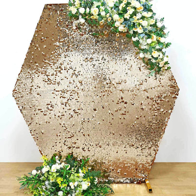 Hexagon sequin backdrop with floral accents for events and photo shoots.
