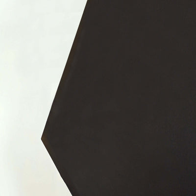 Black hexagonal tabletop on a plain white background