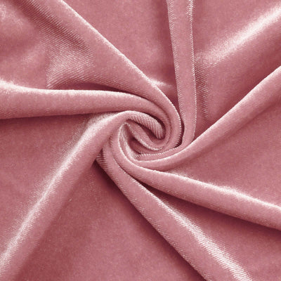 Soft pink velvet fabric with a smooth, luxurious texture.