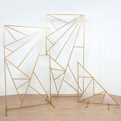 Geometric gold metal display stands in various sizes on a white background