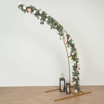 Floral arch with lanterns and candles for events or weddings.