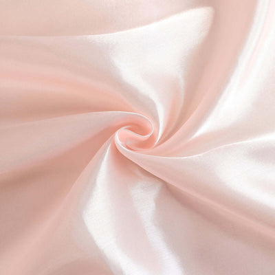 Soft pink satin fabric with a smooth, shiny texture.