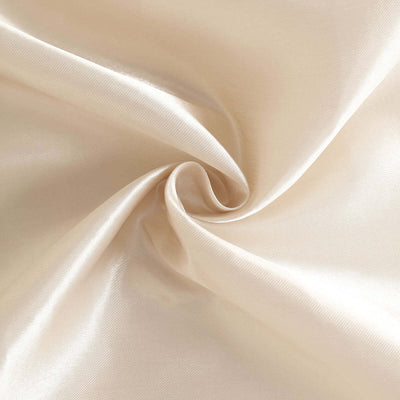Cream satin fabric with smooth texture and elegant drape.