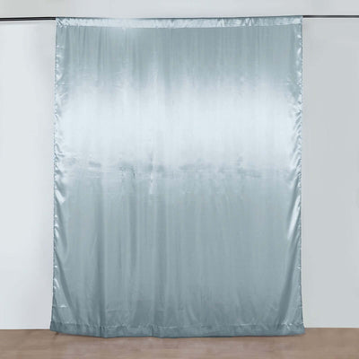 Light blue satin curtain on a plain backdrop