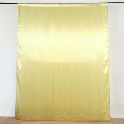 Yellow satin curtain panel on a plain background.