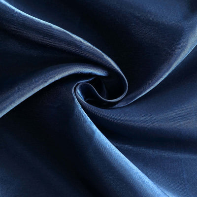 Navy blue fabric close-up showing smooth texture and sheen.