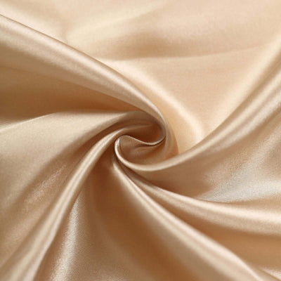 Silky beige fabric with smooth texture and soft sheen.