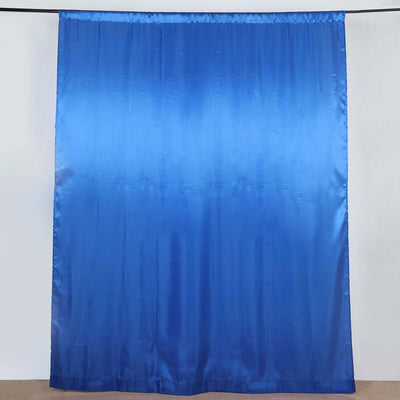 Blue satin curtain draped against a plain background.