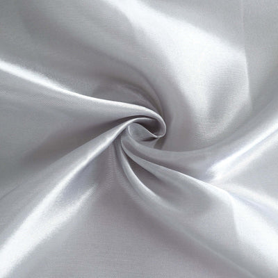Shiny silver satin fabric with a smooth texture and elegant drape.