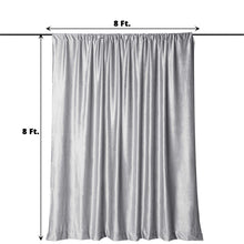 A silver velvet rectangular backdrop curtain with measurements on it is hanging on a pole. Perfect as a room divider, solid backdrop curtain, and dividers.
