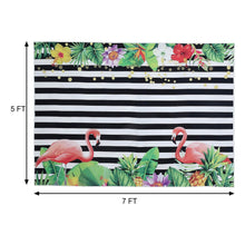 A Vinyl backdrop with black and white stripes, featuring flamingos and tropical flowers