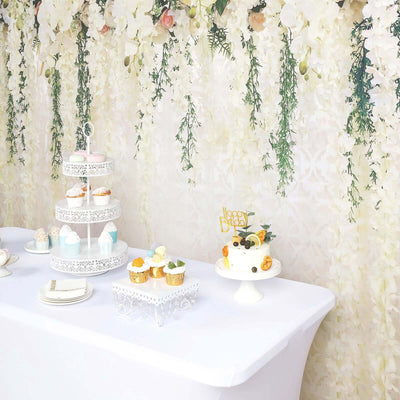 Decorated dessert table with cupcakes and cake for a birthday celebration.
