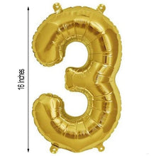 A shiny gold aluminum foil number three balloon