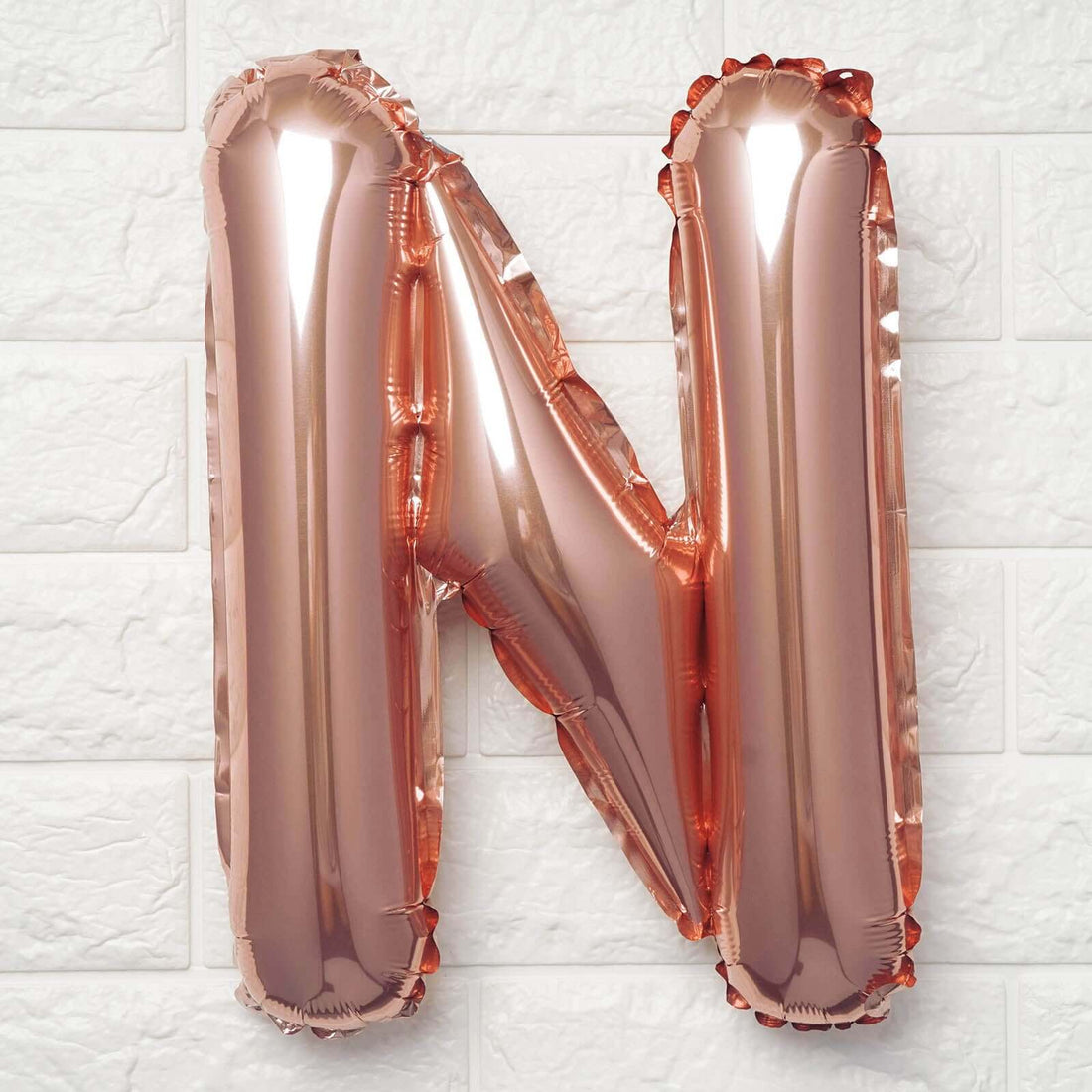 Rose gold foil letter N balloon decoration