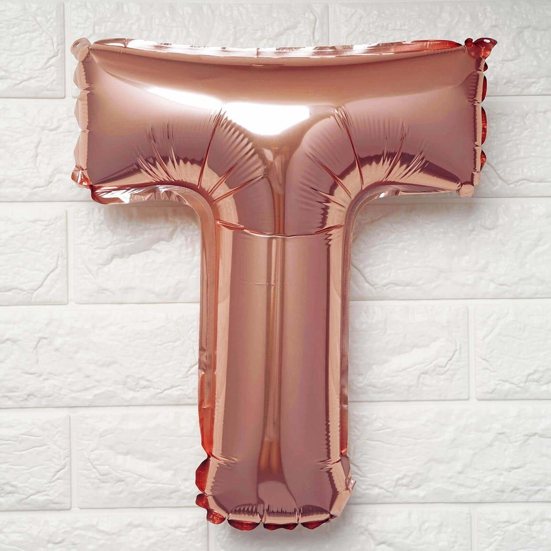Rose gold letter T balloon