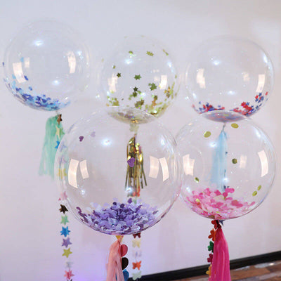 Colorful confetti-filled balloons with ribbons for festive celebrations.