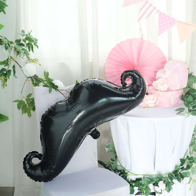 Black mustache balloon decoration for parties and events.